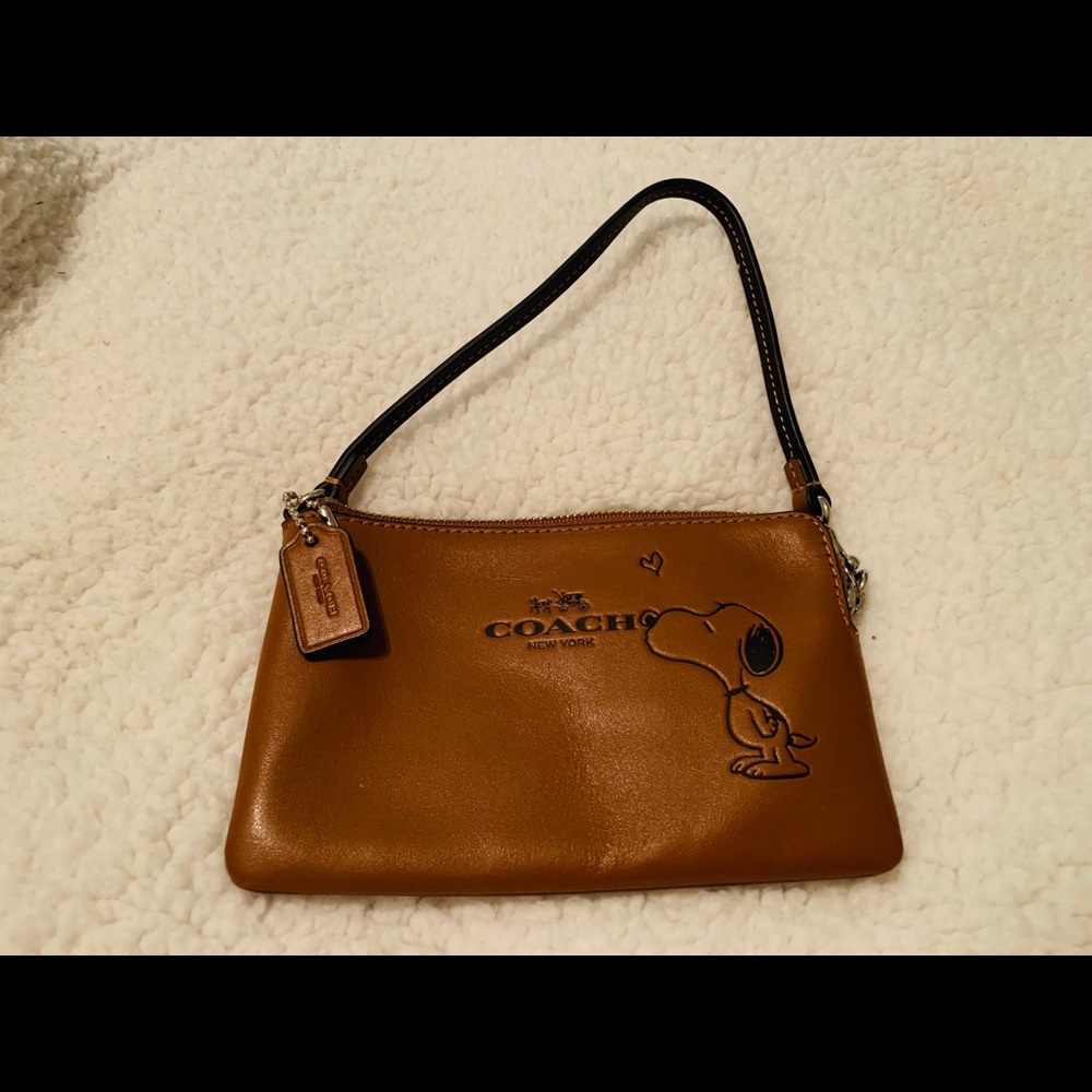 Coach commemorative Snoopy wristlet- brown
